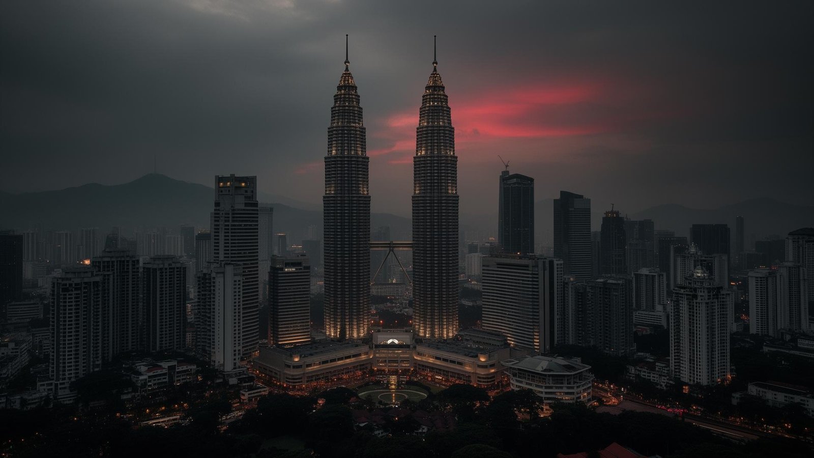 Kuala Lumpur skyline at twilight with the Petronas Twin Towers